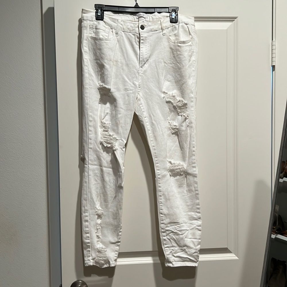 Super destroyed white denim skinny jeans